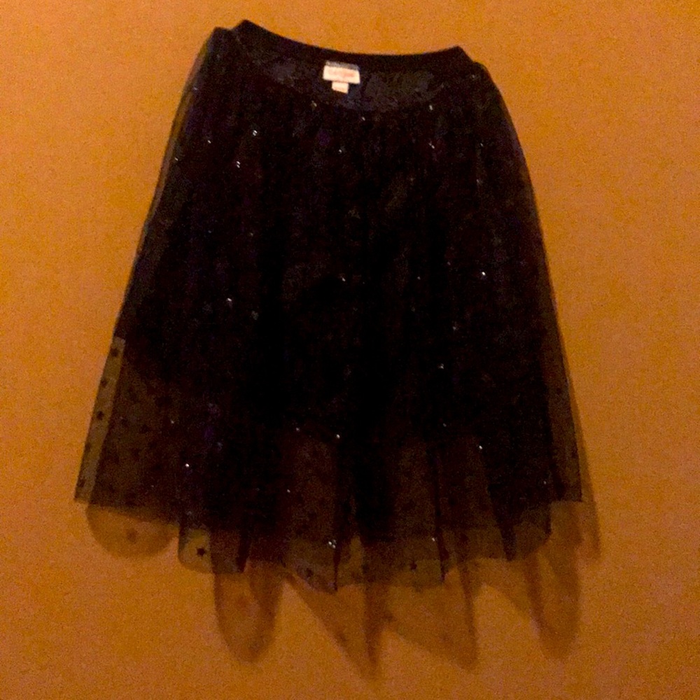 Sparkly black skirt  with clear black stars